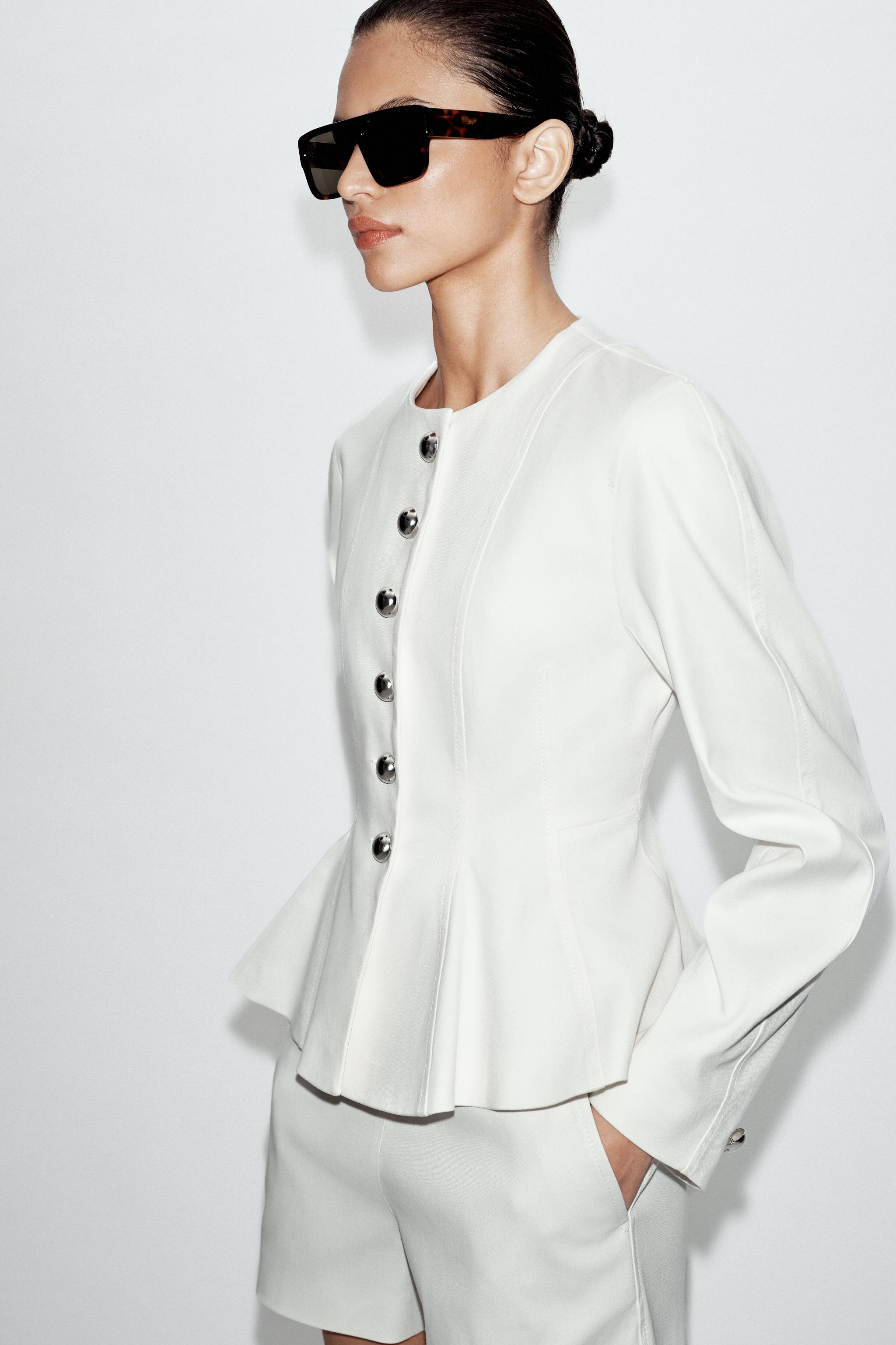 VESTE PEPLUM BOUTONS MÉTALLIQUES